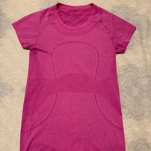 Pink Lululemon athletic shirt